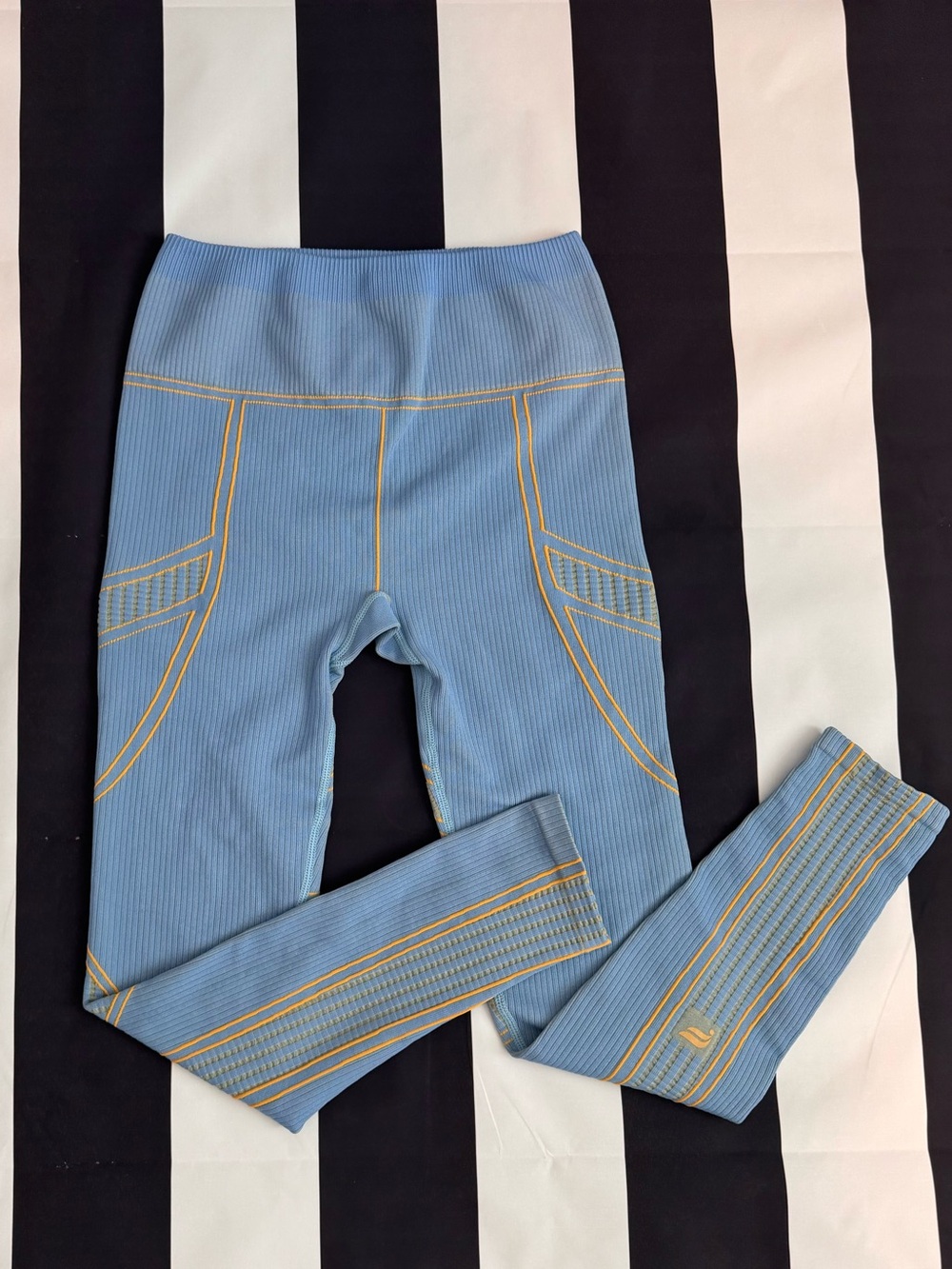 Fabletics Sky Blue Ribbed Leggings with Yellow Contrast Stitching